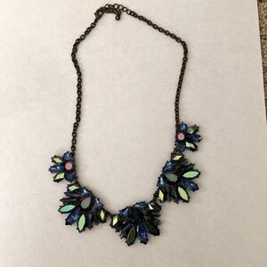 Bejeweled blue beaded necklace.